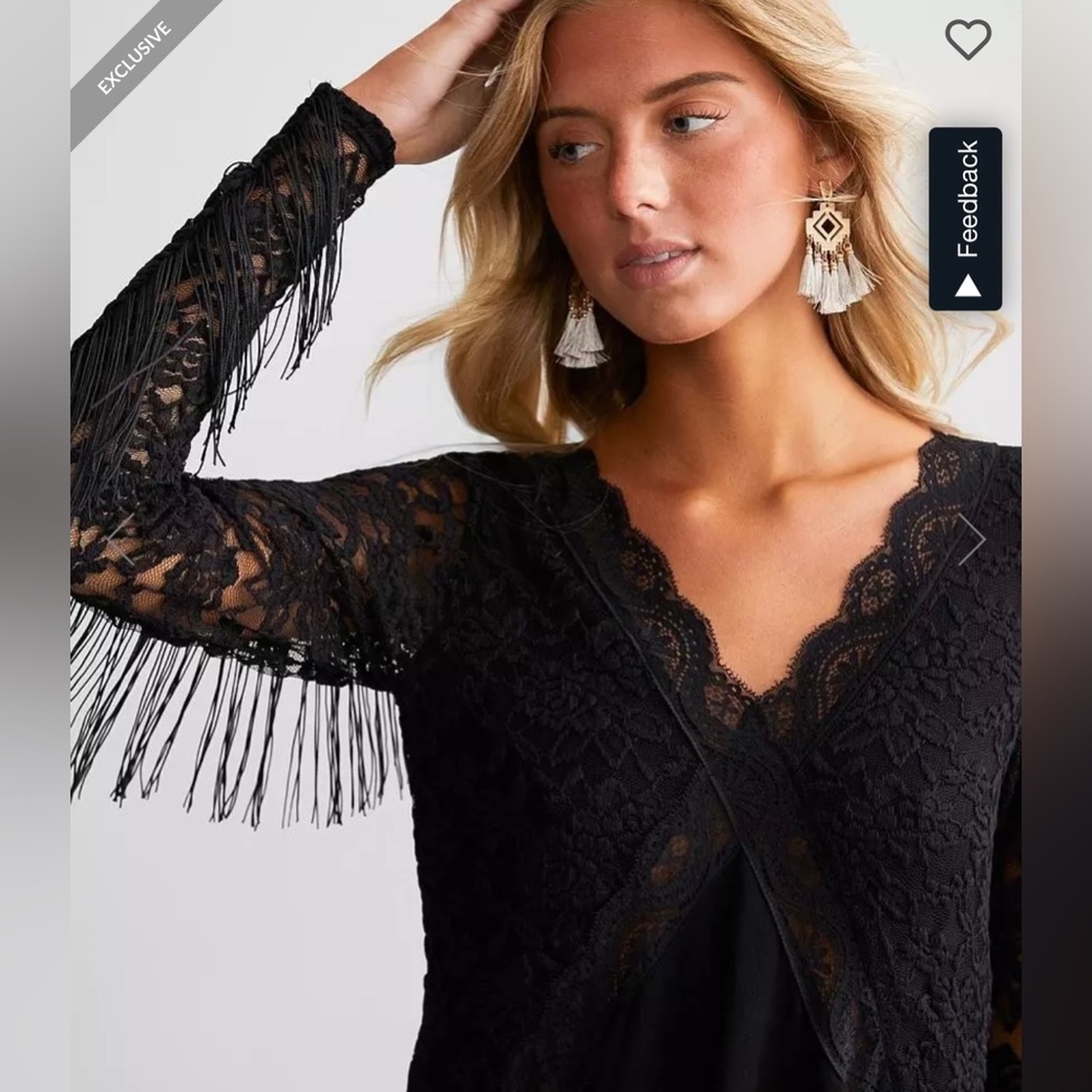 Woman’s fringe black blouse